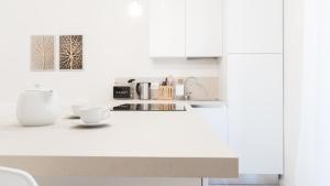 A kitchen or kitchenette at Italianway - Vincenzo Monti 36