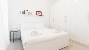 A bed or beds in a room at Italianway - Vincenzo Monti 36