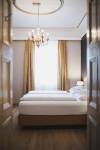Postel nebo postele na pokoji v ubytování Hotel Adria