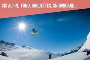 a man flying through the air while riding a snowboard at Maison La Luzienne - Lou Astiou in Luz-Saint-Sauveur
