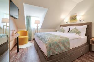 Postel nebo postele na pokoji v ubytování Hotel Tiffany
