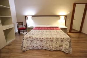 Postel nebo postele na pokoji v ubytování Hotel Europa