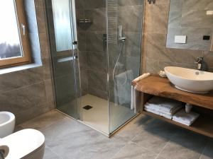 Koupelna v ubytování Hotel Piedibosco