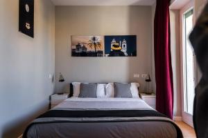 A bed or beds in a room at Top Floor Trastevere