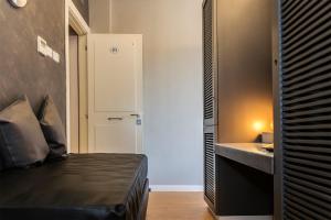 A bed or beds in a room at Top Floor Trastevere