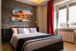 A bed or beds in a room at Top Floor Trastevere
