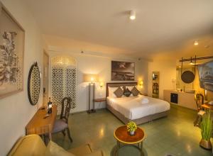 เตียงในห้องที่ Margosa Boutique Hotel Tel-Aviv Jaffa