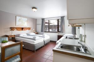 Letto o letti in una camera di Eric the Red Guesthouse