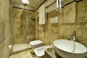 Ванная комната в Hotel Lamberti
