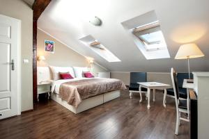 Łóżko lub łóżka w pokoju w obiekcie Leone Aparthotel