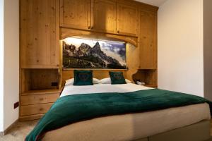 Posteľ alebo postele v izbe v ubytovaní Hotel Isolabella Wellness