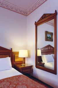 Voodi või voodid majutusasutuse Serenada Golden Palace - Boutique Hotel toas