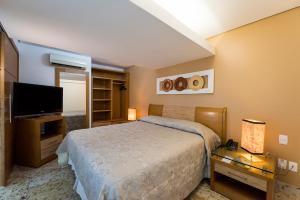 Postel nebo postele na pokoji v ubytování Coral Plaza Apart Hotel