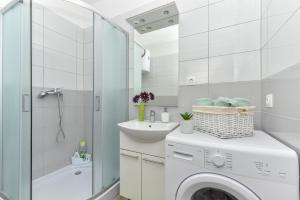 Kúpeľňa v ubytovaní Studio Apartment Deluxe + 32 fotografií
