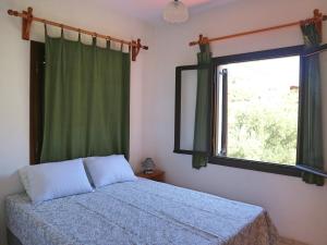 Posteľ alebo postele v izbe v ubytovaní Oliaria Apartments