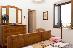 Postel nebo postele na pokoji v ubytování Casa Colonica
