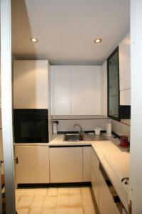 A kitchen or kitchenette at Appartamento a Palazzo Vinci
