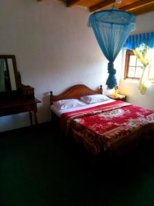 מיטה או מיטות בחדר ב-Nuwara eliya mountain view homestay
