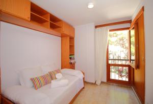 Posteľ alebo postele v izbe v ubytovaní FAMILY SEAFRONT APT FANTASTIC SEAVIEW