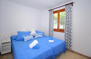 Posteľ alebo postele v izbe v ubytovaní FAMILY SEAFRONT APT FANTASTIC SEAVIEW