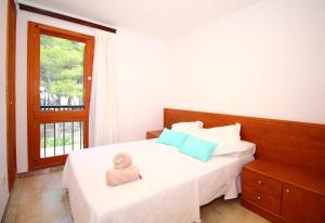 Posteľ alebo postele v izbe v ubytovaní FAMILY SEAFRONT APT FANTASTIC SEAVIEW