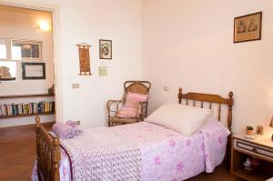 Postel nebo postele na pokoji v ubytování Casa Colonica