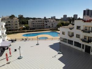 a view of a swimming pool on a building at Dunas do Alvor apartment 146 in Alvor