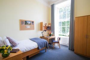 เตียงในห้องที่ Trinity College - Campus Accommodation