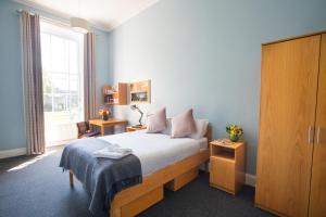 Cama o camas de una habitación en Trinity College - Campus Accommodation
