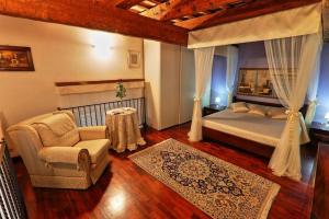 A bed or beds in a room at Appartamento a Palazzo Vinci