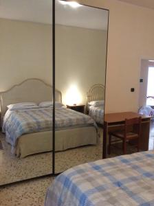 A bed or beds in a room at Gene Holiday Home