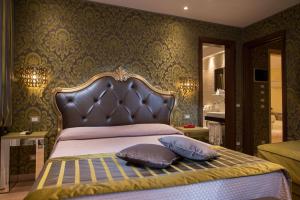 A bed or beds in a room at Ca' Marinella