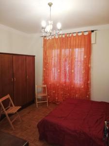 Łóżko lub łóżka w pokoju w obiekcie Ortensia - Sanremo Apartments