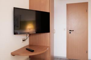 TV o dispositivi per l'intrattenimento presso bp24 Hotel Aachen