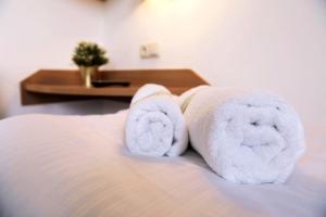 Letto o letti in una camera di bp24 Hotel Aachen