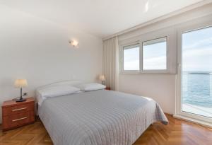 Apartments Zanic on The Beach客房内的一张或多张床位