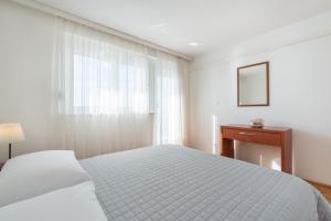 Apartments Zanic on The Beach客房内的一张或多张床位