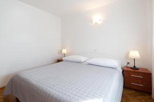 Apartments Zanic on The Beach客房内的一张或多张床位