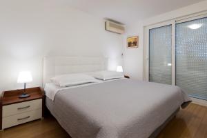 Apartments Zanic on The Beach客房内的一张或多张床位