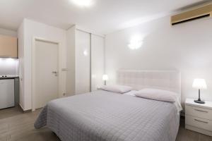 Apartments Zanic on The Beach客房内的一张或多张床位