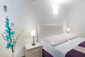 Apartments Zanic on The Beach客房内的一张或多张床位