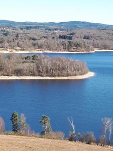 an island in the middle of a large body of water at Chez Nathalie Et Jean Claude in Saint-Marc-à-Frongier