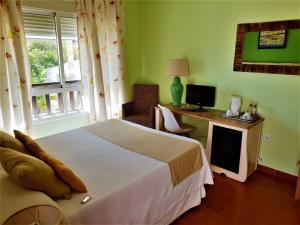 Кровать или кровати в номере Hotel las Calas
