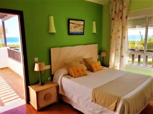 Кровать или кровати в номере Hotel las Calas