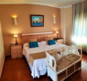 Кровать или кровати в номере Hotel las Calas