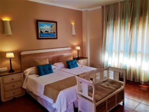 Кровать или кровати в номере Hotel las Calas