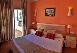 Кровать или кровати в номере Hotel las Calas