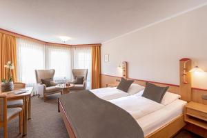 Postel nebo postele na pokoji v ubytování Hotel Riedenburg