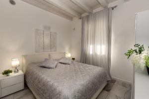 Posteľ alebo postele v izbe v ubytovaní Apartment Blue Laguna + 22 fotografií