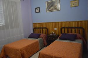 A bed or beds in a room at Casa Los Barranquillos